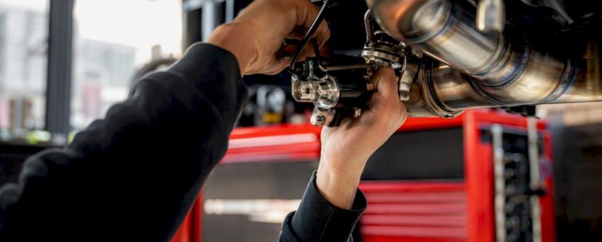 Hands adjusting exhaust valve actuator