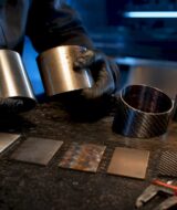 Exhaust tip material samples under inspection