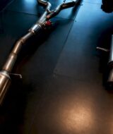 Anonymous exhaust components arranged for comparison