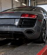 Audi R8 rear exhaust on inspection ramp