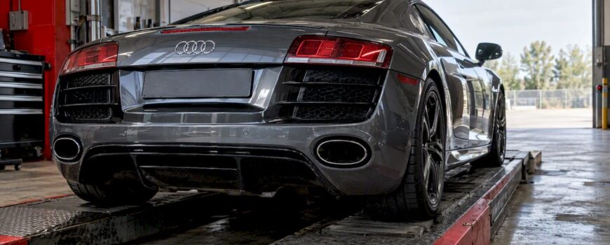 Audi R8 rear exhaust on inspection ramp